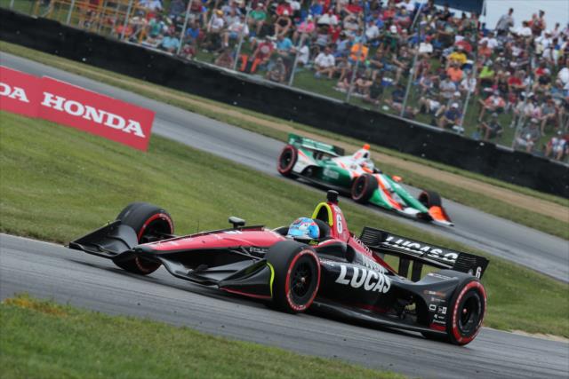 Robert Wickens and Rene Binder sail through the exit of the Keyhole Turn (Turn 2) during the Honda Indy 200 at Mid-Ohio -- Photo by: Matt Fraver