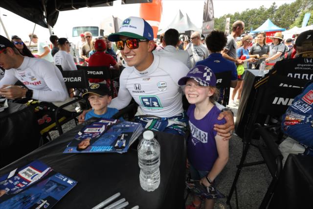 Graham Rahal and fans -- Photo by: Chris Jones
