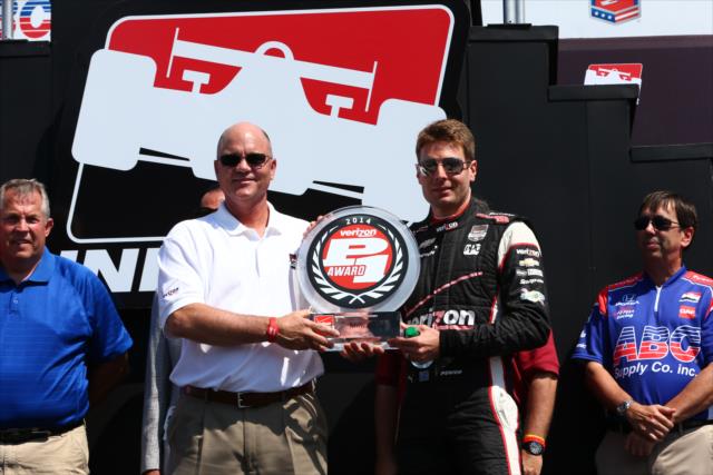 Will Power accepts the Verizon P1 Award trophy for winning the pole for the ABC Supply Wisconsin 250 at the Milwaukee Mile -- Photo by: Chris Jones