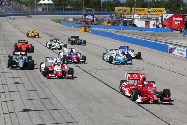 Scott Dixon leads a group of cars at the start of the ABC Supply Wisconsin 250 at the Milwaukee Mile -- Photo by: Chris Jones