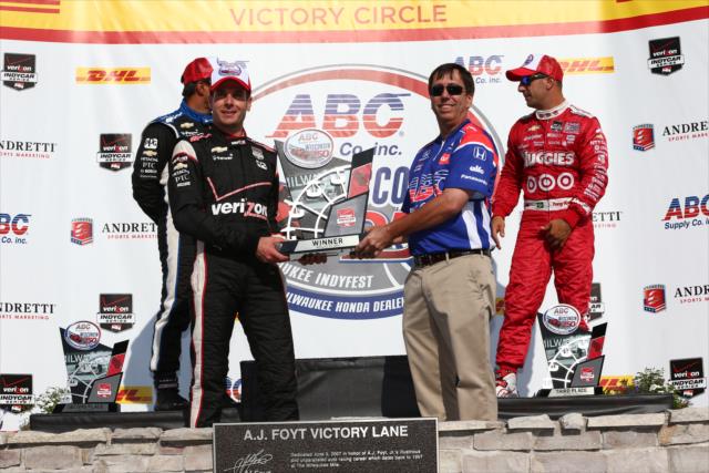 Will Power receives his 1st Place trophy in Victory Lane following the ABC Supply Wisconsin 250 at the Milwaukee Mile -- Photo by: Chris Jones