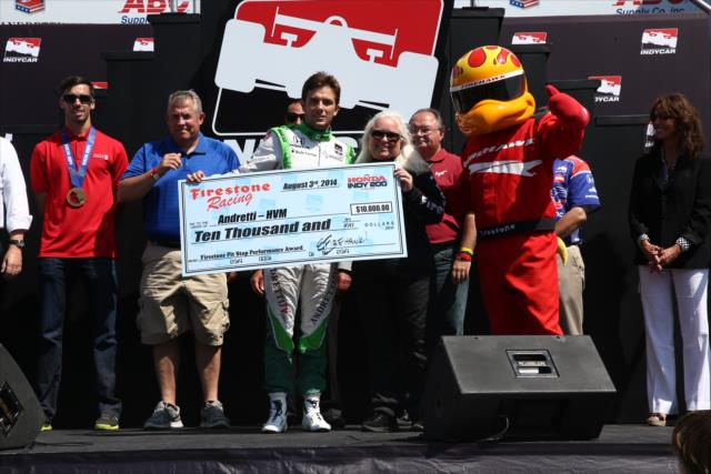 Carlos Munoz accepts the Firestone Pit Stop Performance award for Andretti Autosport for their performance at Mid-Ohio -- Photo by: Chris Jones