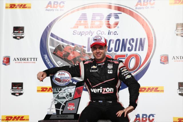 Will Power sits in Victory Circle with his Winner's Trophy after winning the ABC Supply Wisconsin 250 at the Milwaukee Mile -- Photo by: Chris Jones