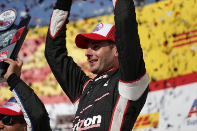 Will Power raises his trophy after winning the ABC Supply Wisconsin 250 at the Milwaukee Mile -- Photo by: Shawn Gritzmacher