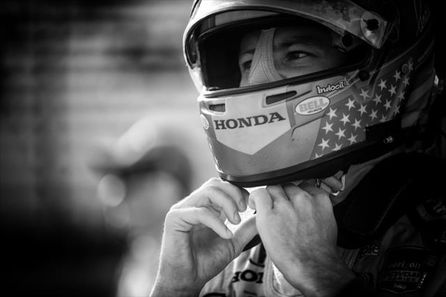 Marco Andretti makes a final adjustment to his helmet prior to the start of the ABC Supply Wisconsin 250 at the Milwaukee Mile -- Photo by: Shawn Gritzmacher