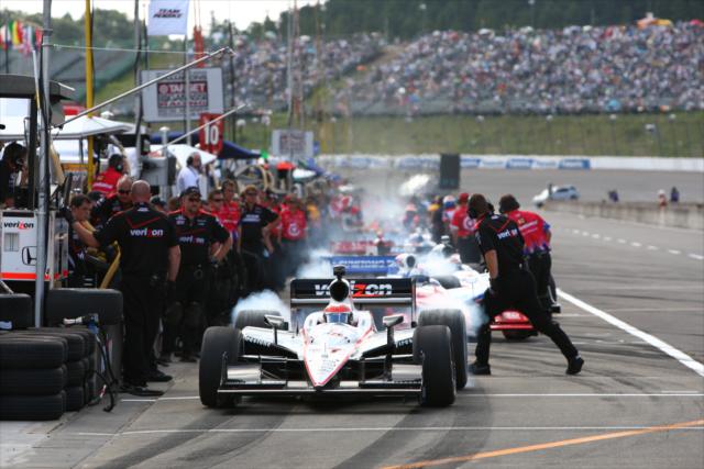 Will Power burns out of the pits -- Photo by: Chris Jones