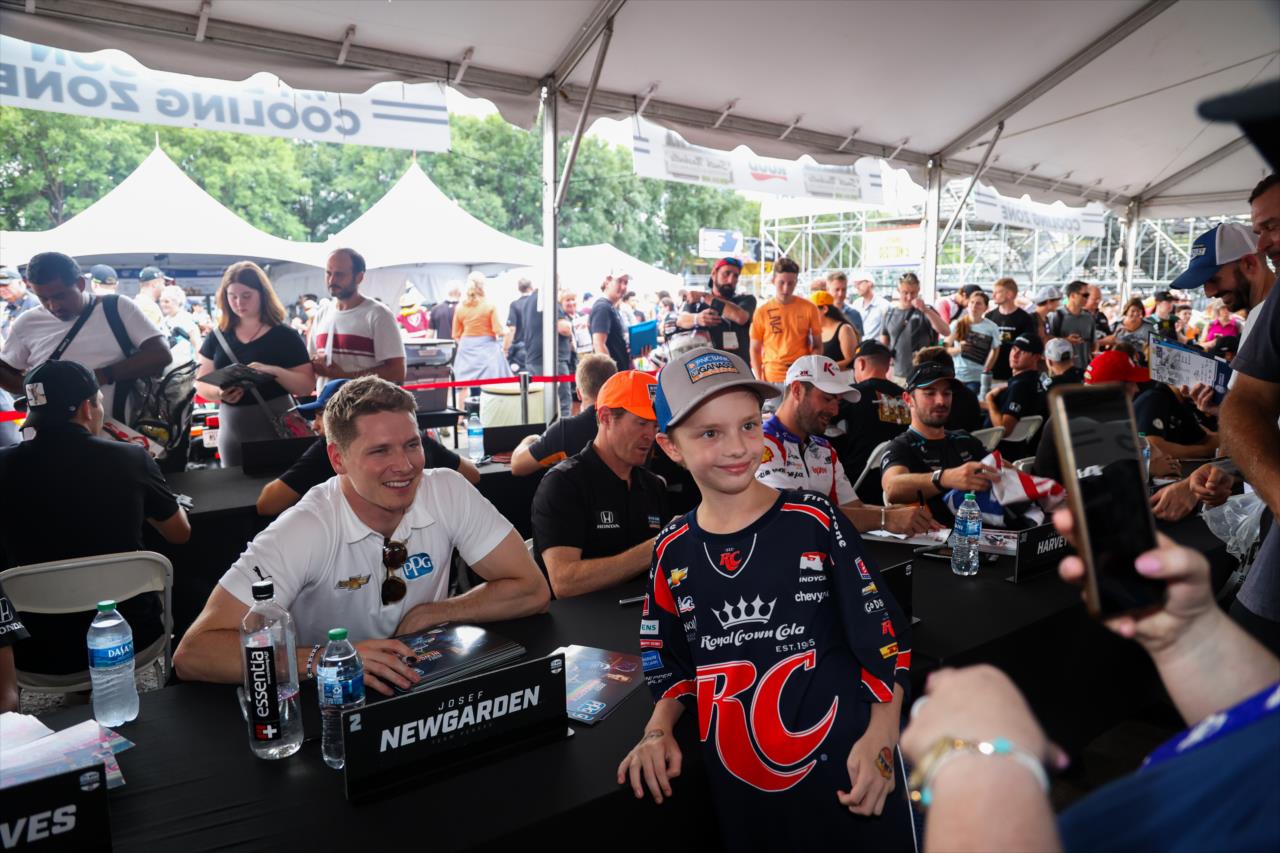 Josef Newgarden takes a photo with a fan - Big Machine Music City Grand Prix - By: Travis Hinkle -- Photo by: Travis Hinkle