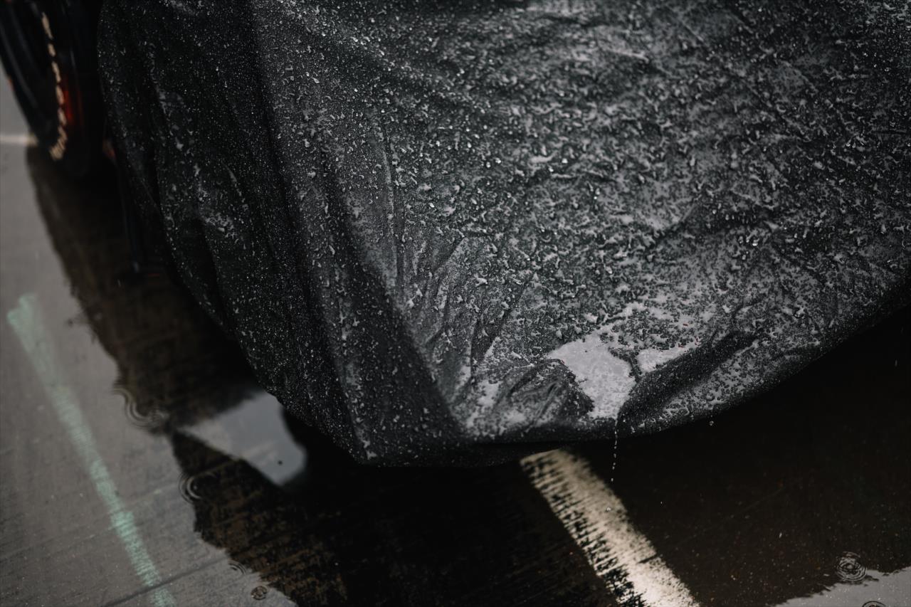 Rain puddles on a car cover - Big Machine Music City Grand Prix - By: Joe Skibinski -- Photo by: Joe Skibinski