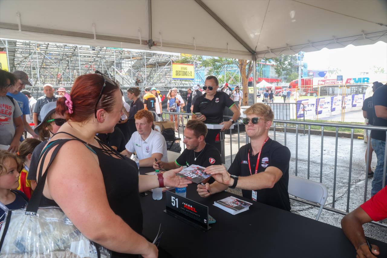 Jacob Abel signs an autograph for a fan - INDY NXT By Firestone Music City Grand Prix - By: Travis Hinkle -- Photo by: Travis Hinkle