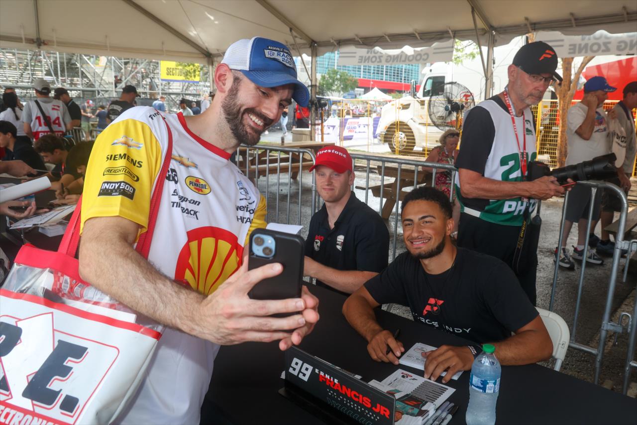 Ernie Francis Jr. takes a photo with a fan - INDY NXT By Firestone Music City Grand Prix - By: Travis Hinkle -- Photo by: Travis Hinkle
