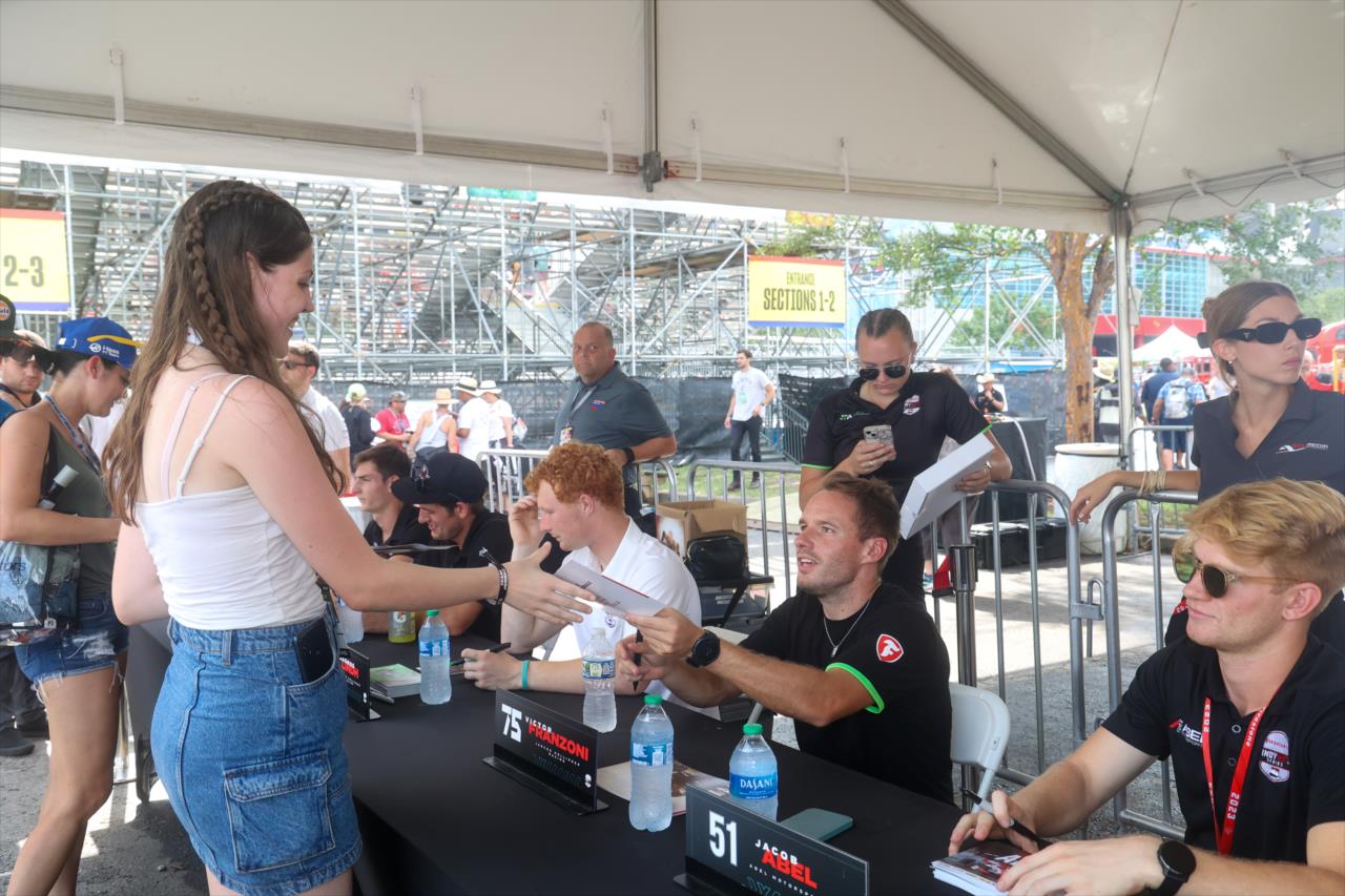 Victor Franzoni signs an autograph for a fan - INDY NXT By Firestone Music City Grand Prix - By: Travis Hinkle -- Photo by: Travis Hinkle
