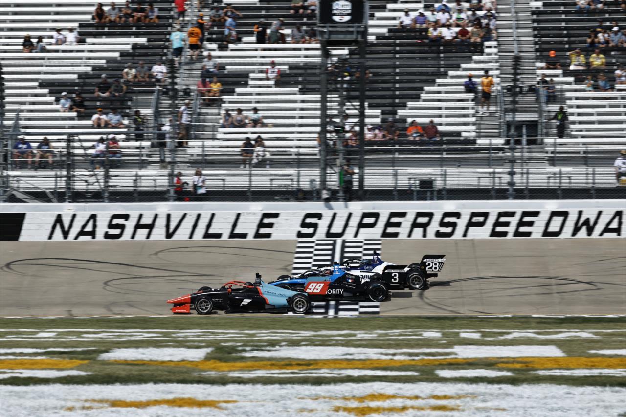 Three-wide - INDY NXT by Firestone Music City Grand Prix - By: Chris Jones -- Photo by: Chris Jones