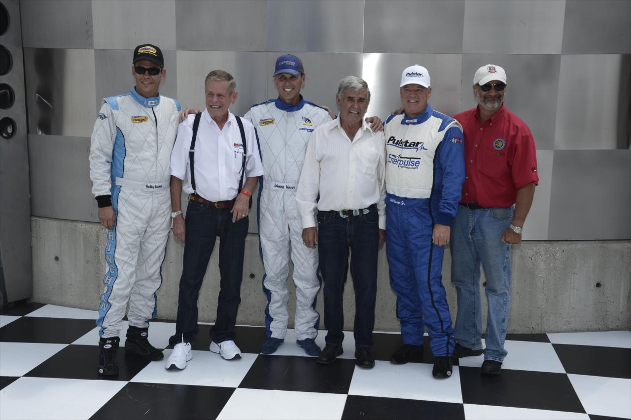 The Unser family (from left - Robby, Bobby, Johnny, Al Sr., Al Jr.) and SVRA's Tony Parella