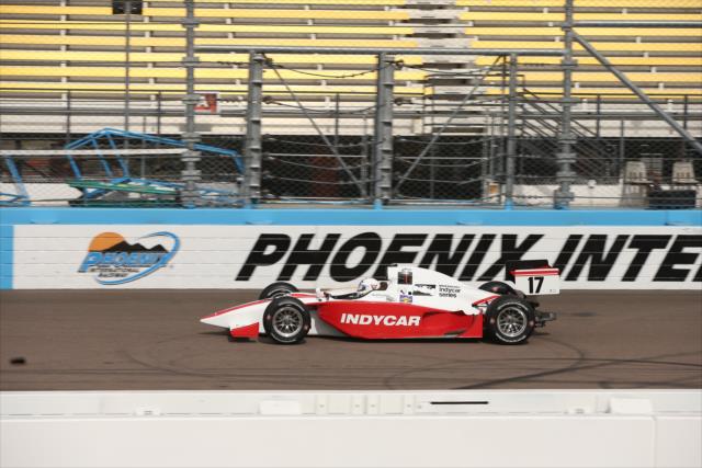 Jay Leno streaks down the frontstretch Phoenix International Raceway -- Photo by: Chris Jones