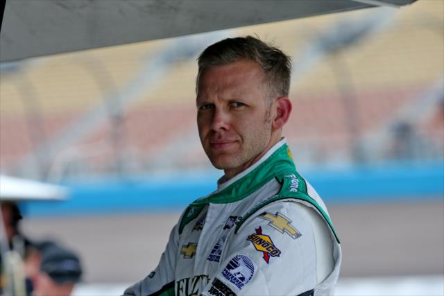 Ed Carpenter looks on from his pit stand during the Phoenix Open Test at Phoenix International Raceway -- Photo by: Chris Jones