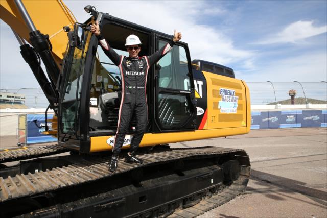 Helio Castroneves ready to board the excavator to break ground for the Phoenix International Raceway modernization project -- Photo by: Chris Jones