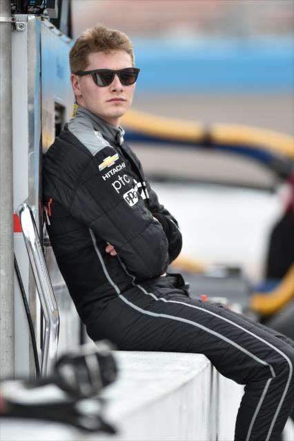 Josef Newgarden sits on pit wall prior to the evening test session during the Phoenix Open Test at Phoenix International Raceway -- Photo by: Chris Owens