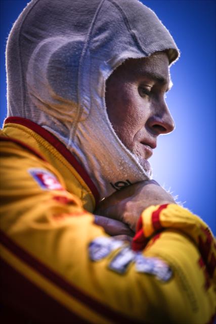Ryan Hunter-Reay adjusts his balaclava on pit lane during the Phoenix Open Test at Phoenix International Raceway -- Photo by: Shawn Gritzmacher
