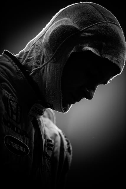 The silhouette of Ryan Hunter-Reay on pit lane during the Phoenix Open Test at Phoenix International Raceway -- Photo by: Shawn Gritzmacher