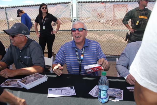 1983 Indianapolis 500 champion Tom Sneva signs an autograph during the legends autograph session at Phoenix Raceway -- Photo by: Richard Dowdy