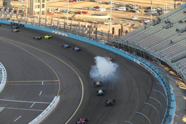 Cars start to evade in Turn 1 during the Desert Diamond West Valley Phoenix Grand Prix -- Photo by: Richard Dowdy