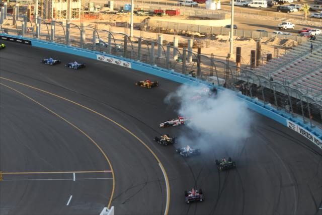 Cars start to evade in Turn 1 during the Desert Diamond West Valley Phoenix Grand Prix -- Photo by: Richard Dowdy