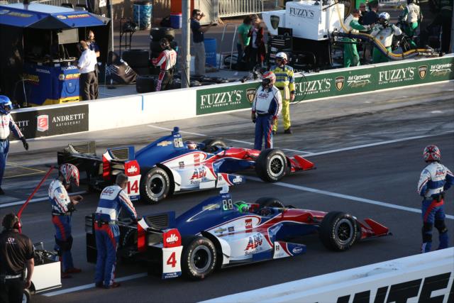 A.J. Foyt Racing teammates Carlos Munoz and Conor Daly on the grid prior to the start of the Desert Diamond West Valley Phoenix Grand Prix -- Photo by: Chris Jones