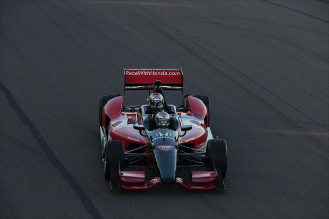 Mario Andretti pilots the two-seater during the parade laps prior to the start of the Desert Diamond West Valley Phoenix Grand Prix -- Photo by: Chris Jones
