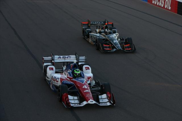 Conor Daly and Ed Carpenter roll down the frontstretch during the parade laps prior to the start of the Desert Diamond West Valley Phoenix Grand Prix -- Photo by: Chris Jones