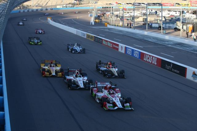 Marco Andretti leads a group to the start-finish line at the start of the Desert Diamond West Valley Phoenix Grand Prix -- Photo by: Chris Jones