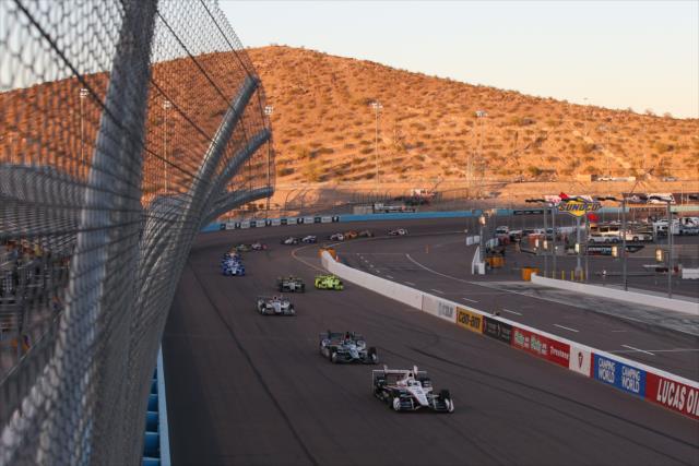 Helio Castroneves leads the field down the frontstretch during the Desert Diamond West Valley Phoenix Grand Prix -- Photo by: Chris Jones