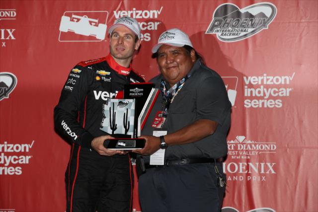 Will Power accepts his 2nd Place trophy in Victory Circle following the Desert Diamond West Valley Phoenix Grand Prix -- Photo by: Chris Jones