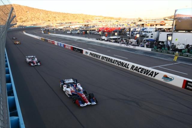 Carlos Munoz leads a group down the frontstretch during the parade laps for Desert Diamond West Valley Phoenix Grand Prix -- Photo by: Chris Jones