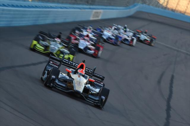 James Hinchcliffe leads a train of cars into Turn 1 during the Desert Diamond West Valley Phoenix Grand Prix -- Photo by: Chris Owens