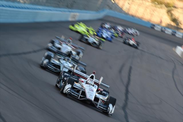 Helio Castroneves leads the field into Turn 1 during the Desert Diamond West Valley Phoenix Grand Prix -- Photo by: Chris Owens
