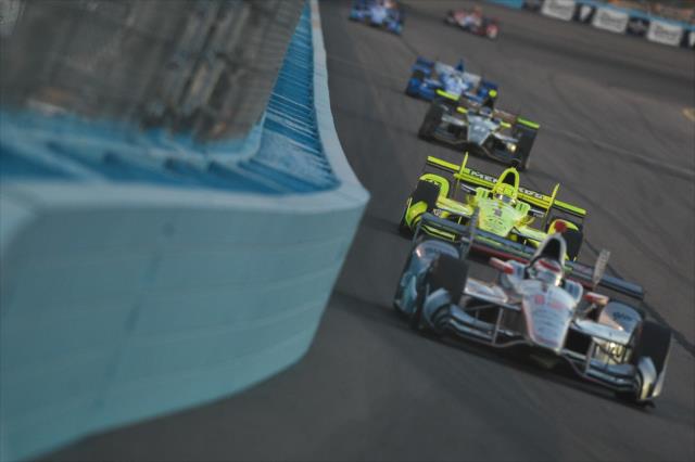 Will Power leads Simon Pagenaud into Turn 1 during the Desert Diamond West Valley Phoenix Grand Prix -- Photo by: Chris Owens