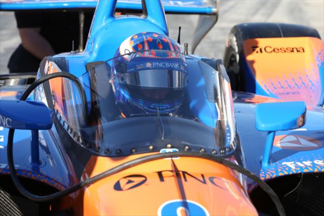 Scott Dixon sits in the No. 9 PNC Bank Honda on pit lane prior to the first oo-track test of the windscreen at ISM Raceway -- Photo by: Chris Jones