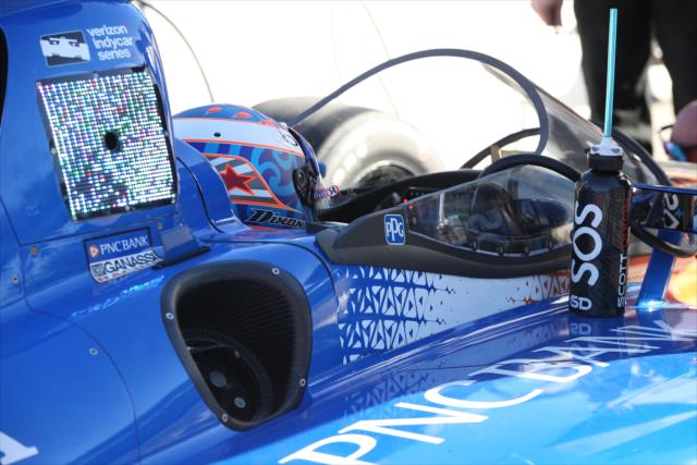Scott Dixon sits in the No. 9 PNC Bank Honda on pit lane prior to the first on-track test of the windscreen at ISM Raceway -- Photo by: Chris Jones