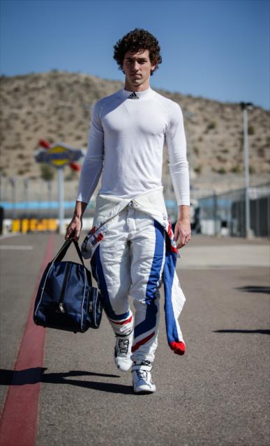 Matheus 'Matt' Leist walks pit lane prior to the rookie oval test at ISM Raceway -- Photo by: Shawn Gritzmacher