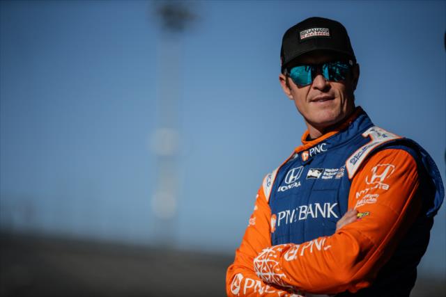 Scott Dixon looks down pit lane prior to the on-track test of the windscreen at ISM Raceway -- Photo by: Shawn Gritzmacher