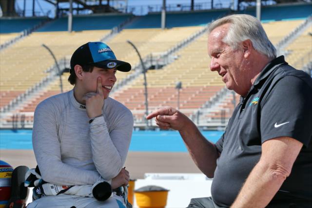 Gabby Chaves chats with team manager Larry Curry on pit lane during the open test at ISM Raceway -- Photo by: Chris Jones