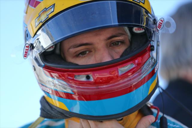 Gabby Chaves straps on his helmet prior to the start of the afternoon open test session at ISM Raceway -- Photo by: Chris Jones