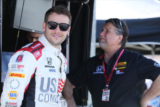 Marco Andretti with his father and team owner, Michael Andretti, on pit lane during the open test at ISM Raceway -- Photo by: Chris Jones