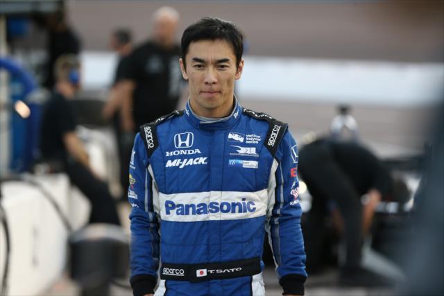 Takuma Sato walks pit lane prior to the evening open test session at ISM Raceway -- Photo by: Chris Jones
