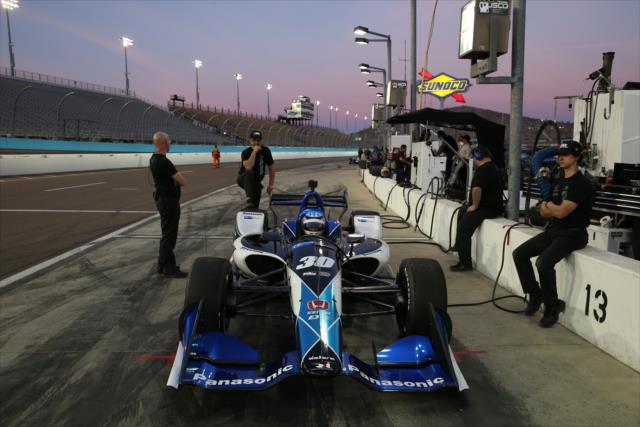 Takuma Sato sits in his No. 30 MiJack Panasonic Honda on pit lane prior to the evening open test session at ISM Raceway -- Photo by: Chris Jones