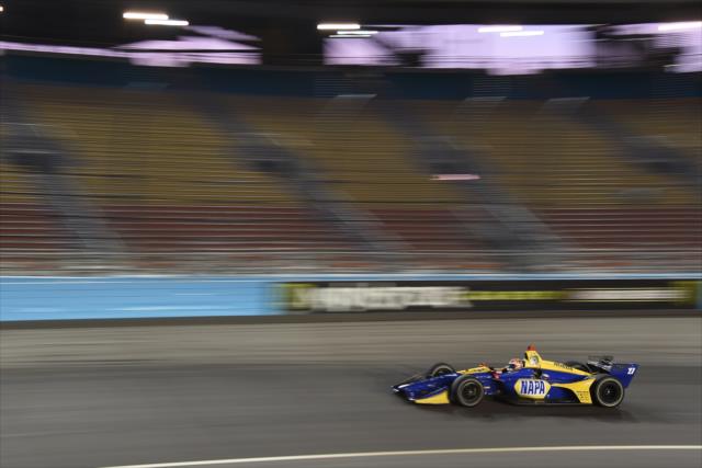 Alexander Rossi streaks through Turn 1 during the evening open test session at ISM Raceway -- Photo by: John Cote