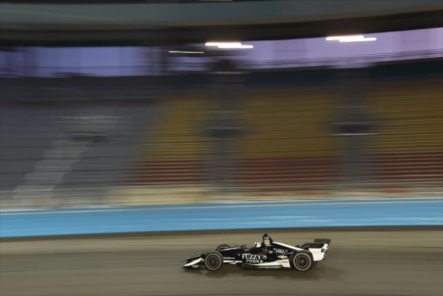 Ed Carpenter streaks through Turn 1 during the evening open test session at ISM Raceway -- Photo by: John Cote