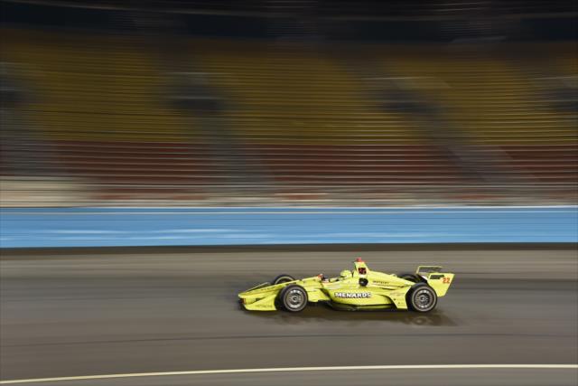 Simon Pagenaud streaks through Turn 1 during the evening open test session at ISM Raceway -- Photo by: John Cote