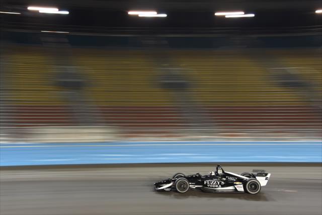 Ed Carpenter streaks through Turn 1 during the evening open test session at ISM Raceway -- Photo by: John Cote