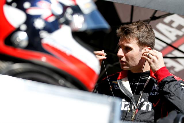 Will Power sets his earpieces along pit lane prior to the afternoon open test session at ISM Raceway -- Photo by: Joe Skibinski